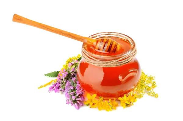Miel en frasco de vidrio —  Fotos de Stock