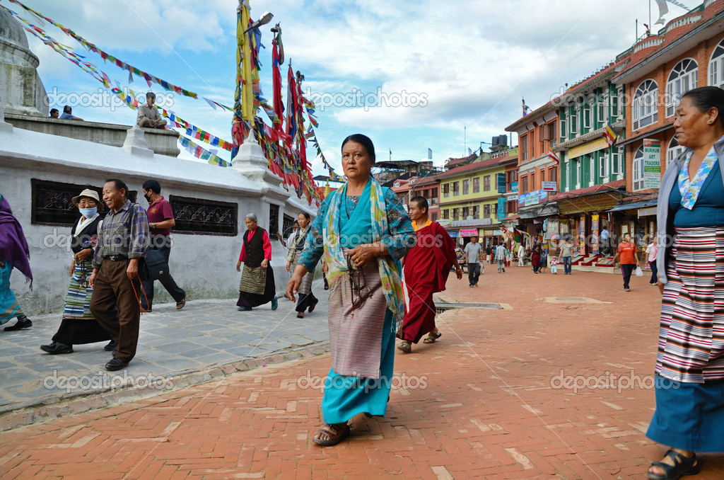 Nepalese kora Kora around Boudhanath Stupa Stock Editorial Photo