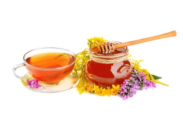 Flowers with tea and honey — Stock Photo, Image