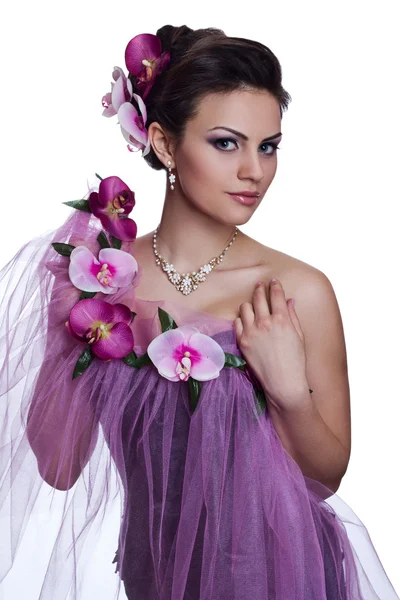 Brunette beautiful woman with flowers — Stock Photo, Image