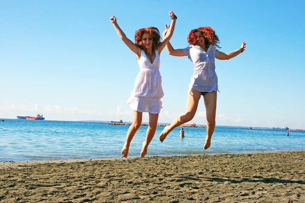 Women on beach — Stock Photo, Image