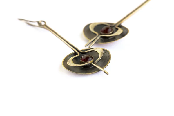 Ancient style earrings with garnet — Stock Photo, Image