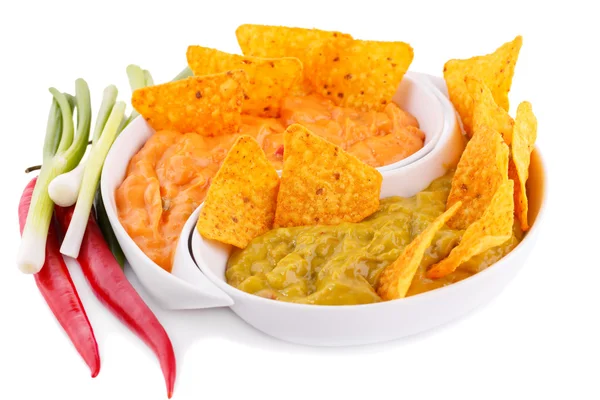 Nachos, guacamole and cheese sauce, vegetables — Stock Photo, Image