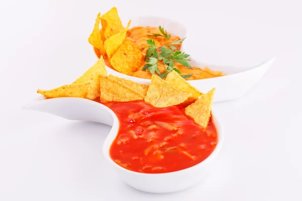 Nachos, cheese and red sauce — Stock Photo, Image