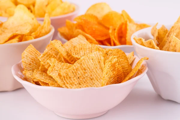 Potato and wheat chips in bowls — Stock Photo, Image