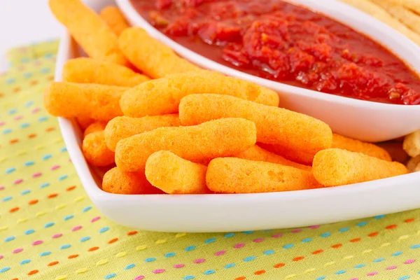 Patatas de maíz y salsa roja —  Fotos de Stock
