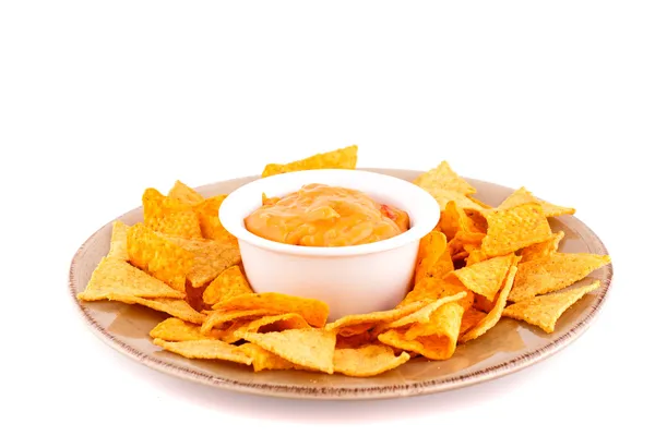 Nachos und Käsesauce — Stockfoto