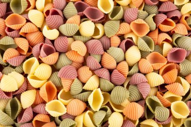 İtalyan sebze kabuklu makarna arka plan olarak yakın plan görüntüsü. Üst yatay görüntü. Görüntü düzleştirildi.