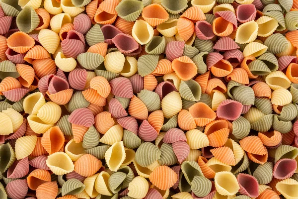 İtalyan sebze kabuklu makarna arka plan olarak yakın plan görüntüsü. Üst yatay görüntü. Görüntü düzleştirildi.