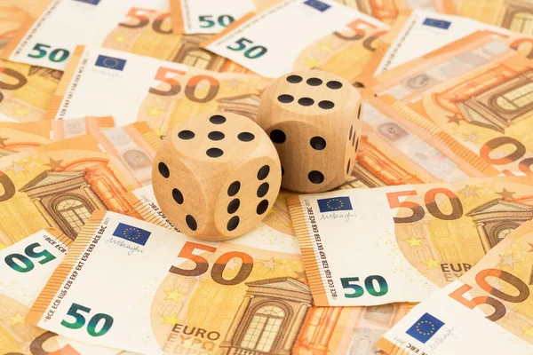 Zwei Holzwürfel Auf Viel Euro Geld Hintergrund — Stockfoto