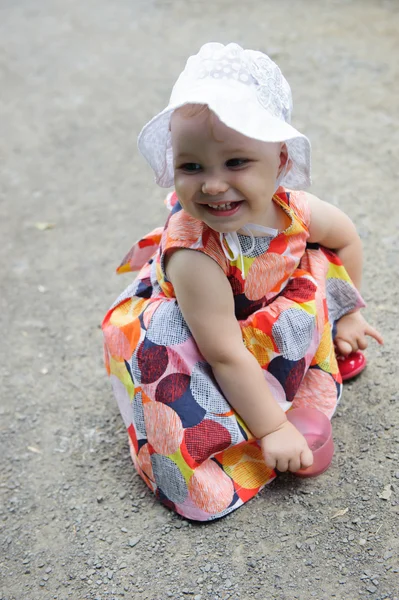 Cute baby girl in white hat — Stock Photo, Image