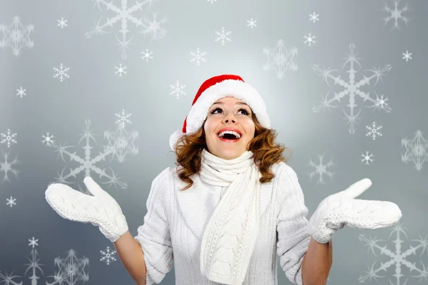 Happy young woman in Santa hat — Stock Photo, Image