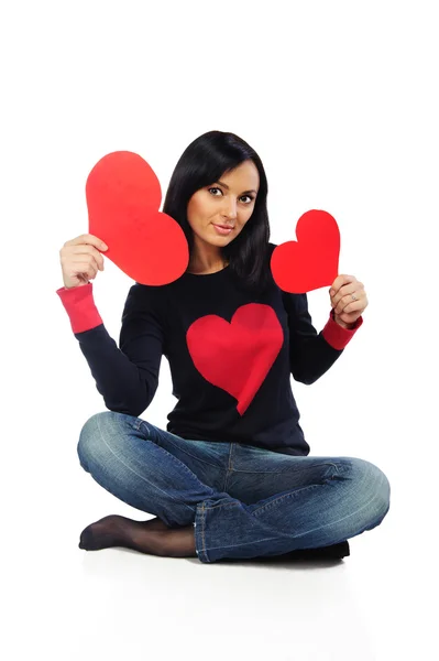 Bella giovane donna con cuori rossi isolati su bianco — Foto Stock