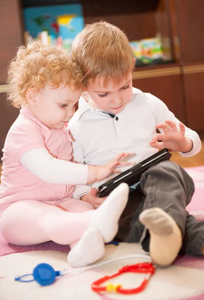 Two kids with digital tablet — Stock Photo, Image