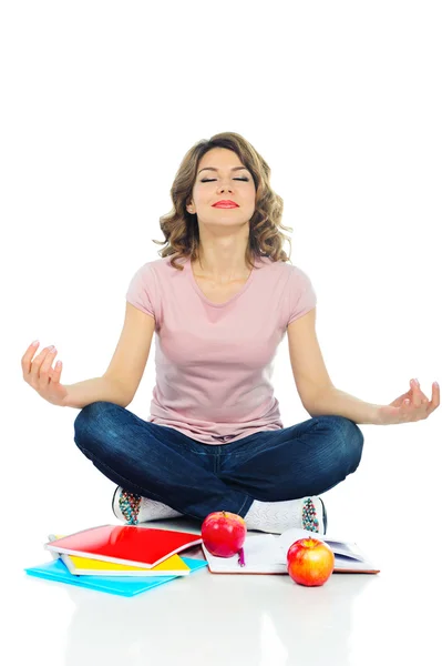 Young pretty female student with red apple isolated on white — Stock Photo, Image