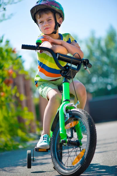 Cute little boy riding bicycle — Stock Photo, Image