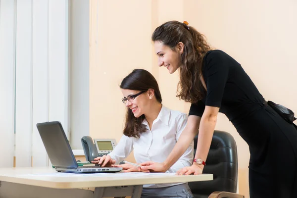 Two business women working at office — Stock Photo, Image