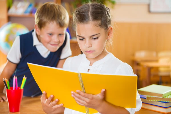 Happy pupils at school — Stock Photo, Image