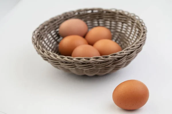 Closeup Fresh Brown Eggs Easter Basket White Background — Stock Photo, Image
