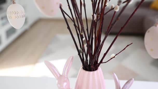 Decorating Easter Table Vase Eater Willow Branches Hanging Eggs Rabbits — Stock Video