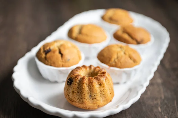 Yummy Baked Muffins Chocolate Pieces White Plate — Fotografia de Stock