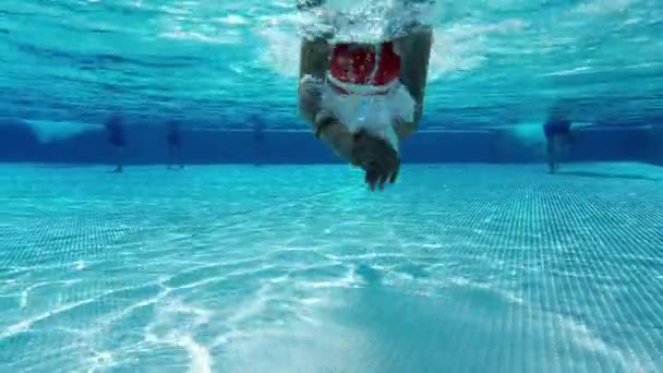 Happy Pretty Little Girl Playing Having Fun Diving Underwater Blue — стоковое видео