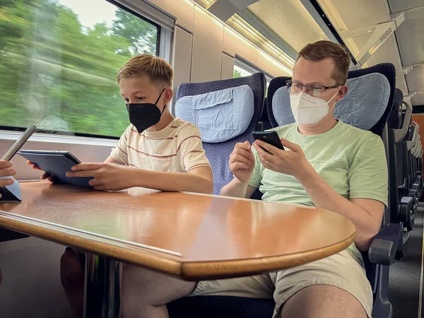 Teen Son His Father Travelling Railroad Watching Movie Tablet — Stock Fotó