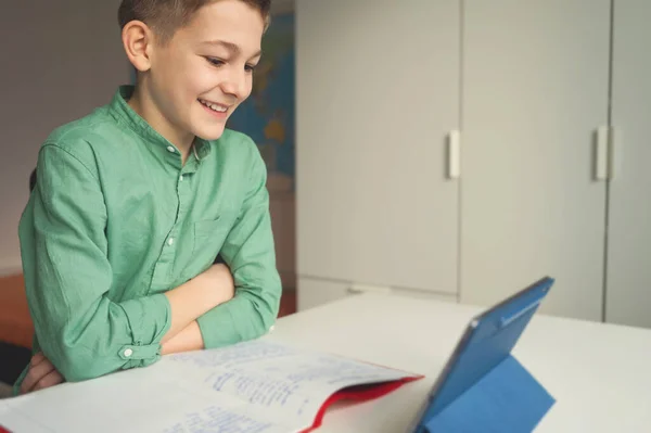 Smiling Schoolboy Chatting His Friends Online Lesson Royalty Free Stock Images