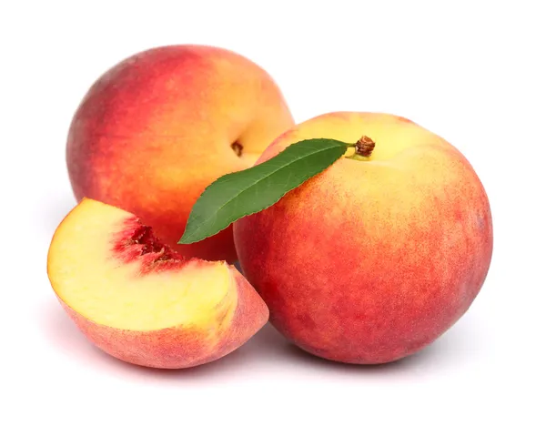 Ripe peach with leaf — Stock Photo, Image