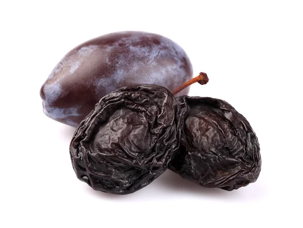 Dried and fresh plums — Stock Photo, Image