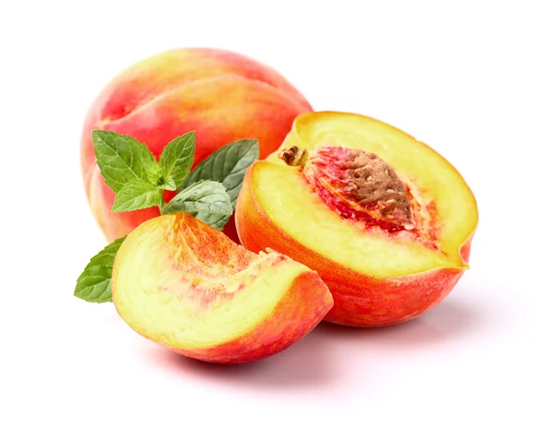 Peaches with peppermint — Stock Photo, Image