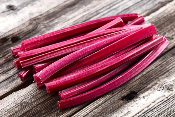 Rhubarb on a wooden backgound — Stock Photo, Image