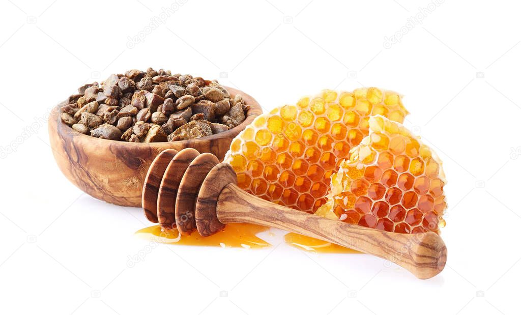 Honeycombs with propolis on white background