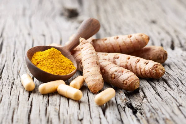 Turmeric Roots Capsules Curry Powder Old Wooden Backgroud — Stock Photo, Image