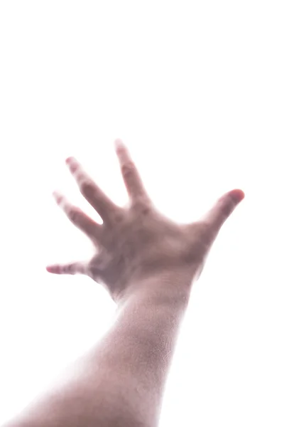 Mężczyzna ręką sięgając światła — Zdjęcie stockowe