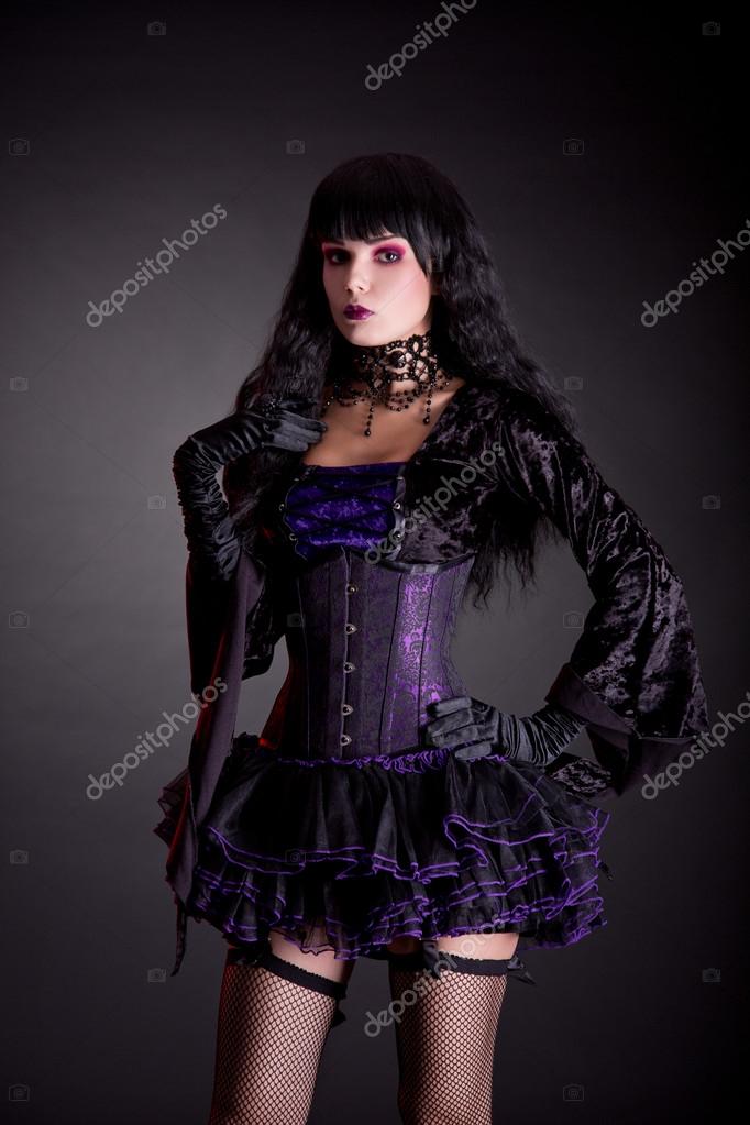 Romantic gothic girl in purple and black outfit Stock Photo by ...