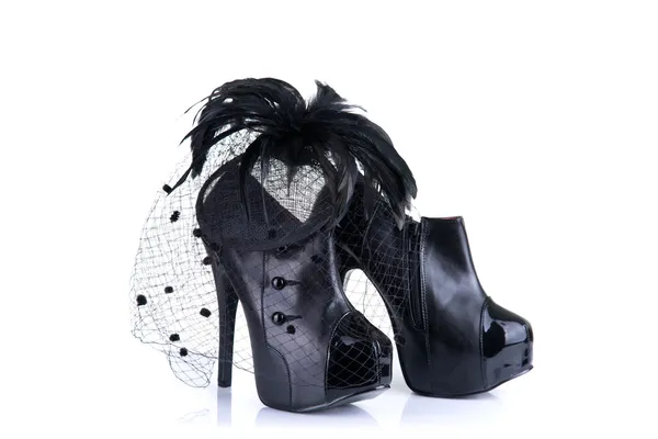 Shoes and feather  fascinator — Stock Photo, Image