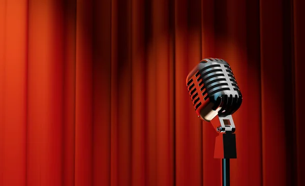 Microphone on red curtain background — Stock Photo, Image