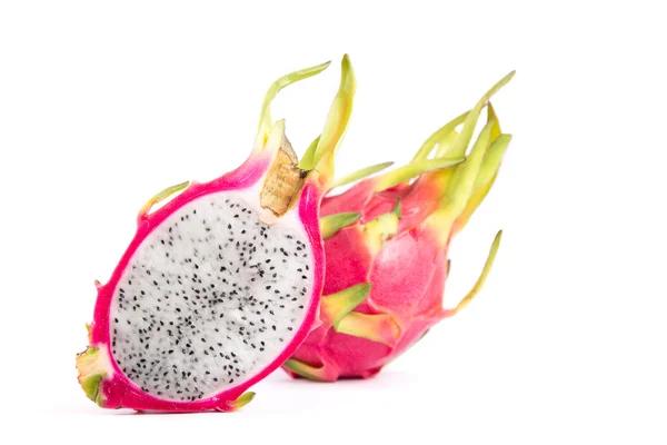 Two dragon fruits, whole and a half — Stock Photo, Image