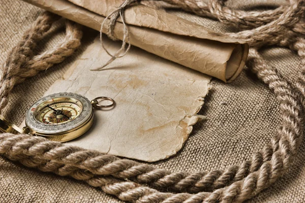 old paper with compass and rope