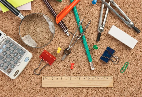 office supplies in a mess on the table