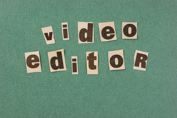 word video editor cut from newspaper on green background