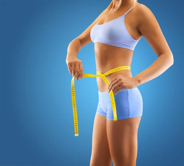 Close up measuring waist — Stock Photo, Image