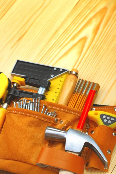 Tools in belt on table — Stock Photo, Image