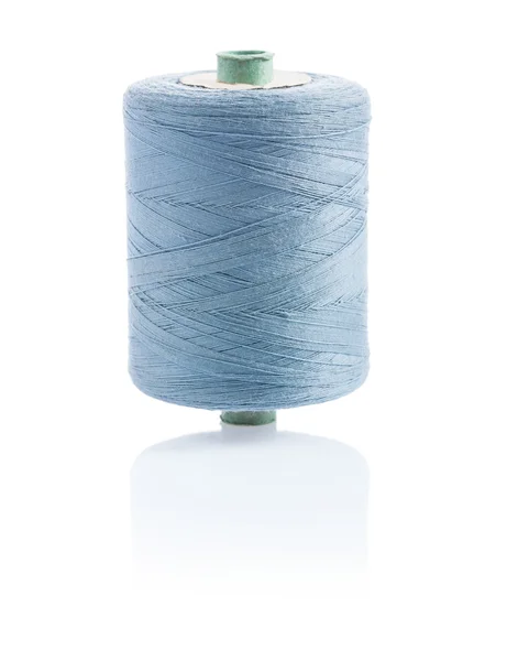 A bobbin with gray sewing string — Zdjęcie stockowe