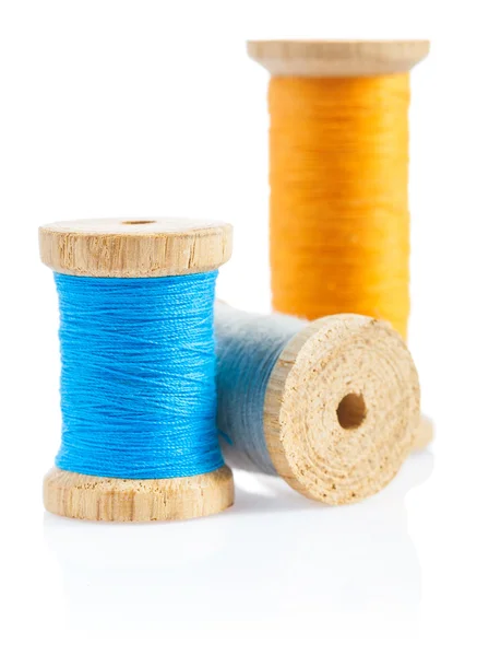 Wooden sewing bobbins — Stock Photo, Image