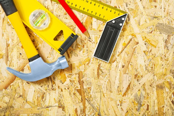 Tools on plywood — Stock Photo, Image