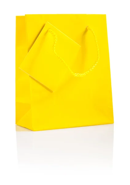 A yellow paper bag isolated — Stock Photo, Image