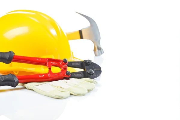 Steel cutter on glove with hardhat and hammer — Stock Photo, Image