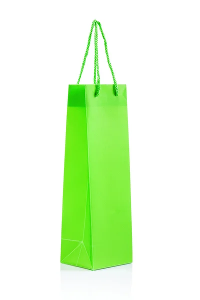 A single green paper bag isolated — Stock Photo, Image